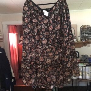 Long full skirt with elastic waist.